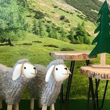 شقة Wellnessapartment Alpenland 22